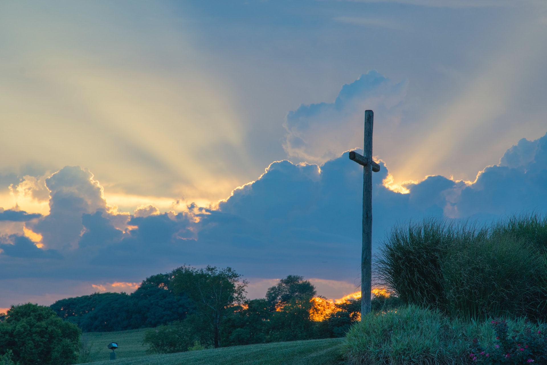 Cross at Sunset - Photo by David Dibert on Unsplash